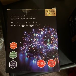 4 unopened led cluster string lights.